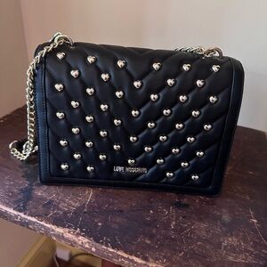 Black and gold Love Moschino purse